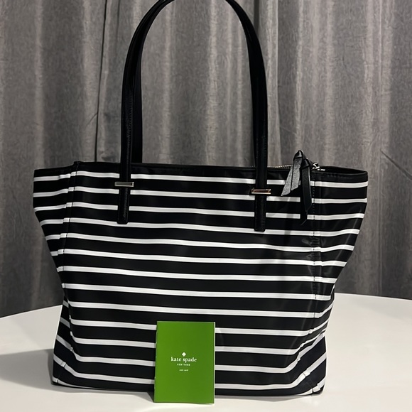 kate spade Handbags - Kate ♠️ Spade New York Kate Spade ♠️ 
black and white
tote with zip closure